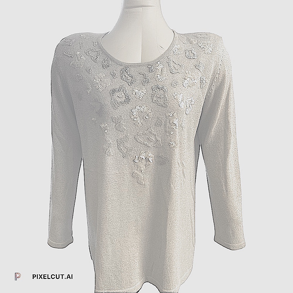 Elegant mildly sparkled silver blouse, design on top, long sleeve, size large.